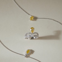 Oval Yellow Diamond Halo Necklace in 950 Platinum (0.62 ct.)