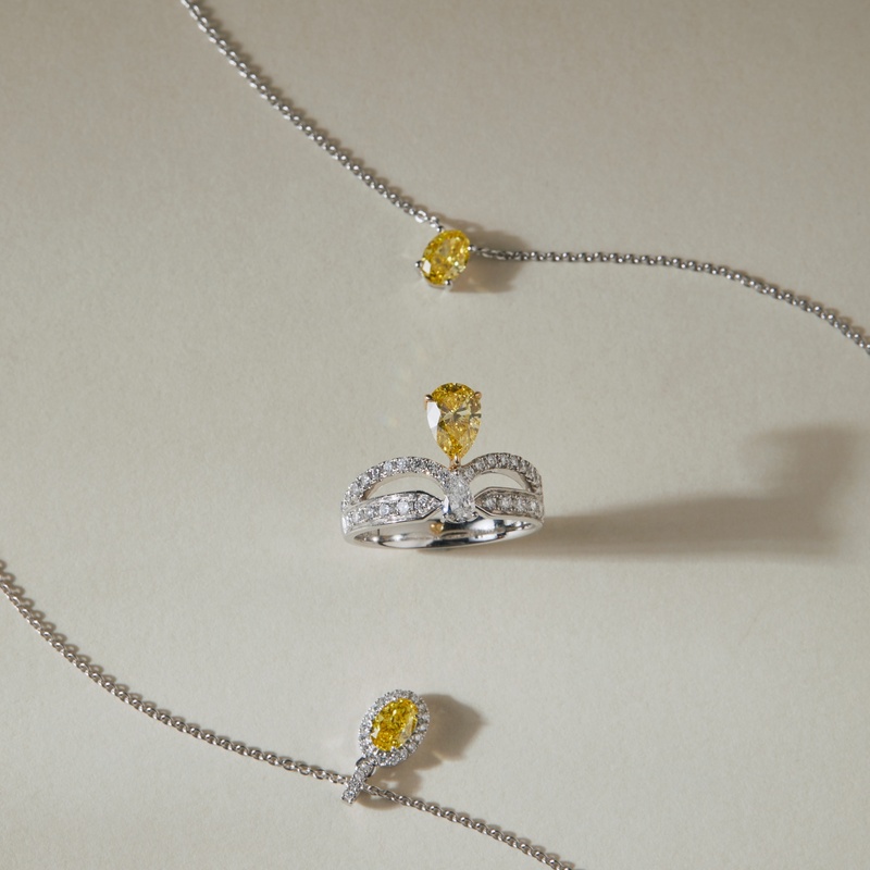 Oval Yellow Diamond Halo Necklace in 950 Platinum (0.62 ct.)